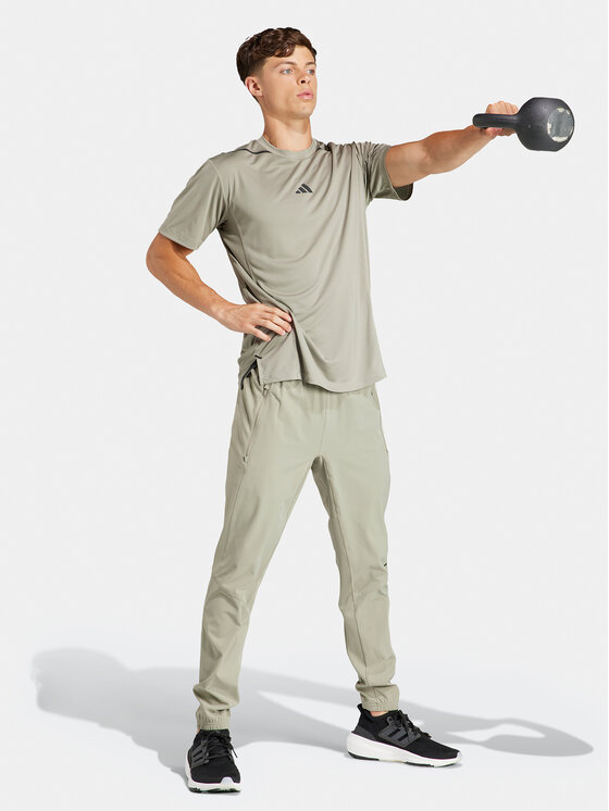 adidas adidas Koszulka techniczna Designed for Training Adistrong IS3838 Zielony Slim Fit