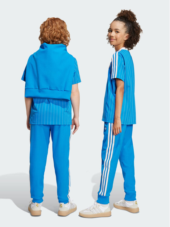 adidas adidas Spodnie dresowe Real Madrid Terrace Icons Niebieski jasny Slim Fit