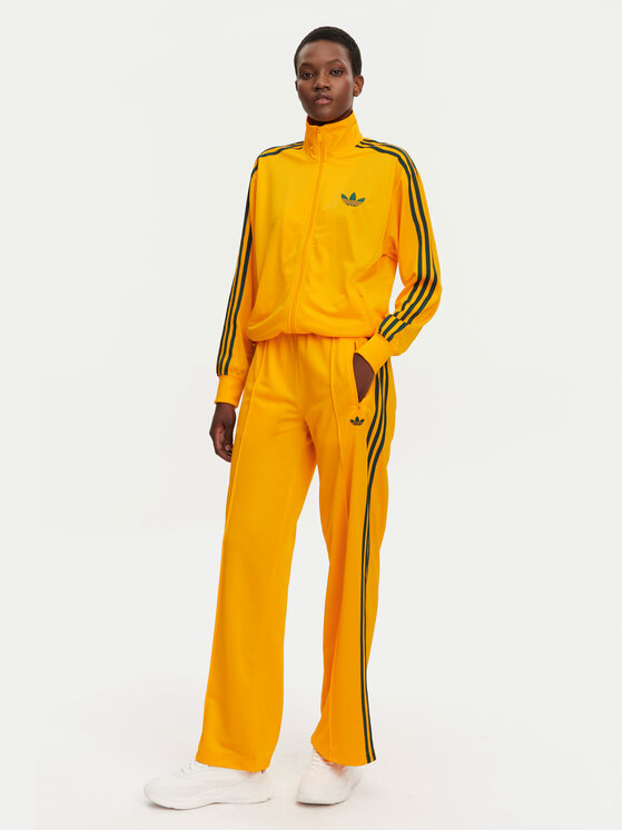 adidas adidas Donji dio trenerke adicolor Classic Firebird JP2316 Žuta Loose Fit