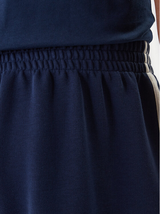 adidas adidas Спортивні штани adicolor Spacer Track KD4087 Cиній Baggy Fit