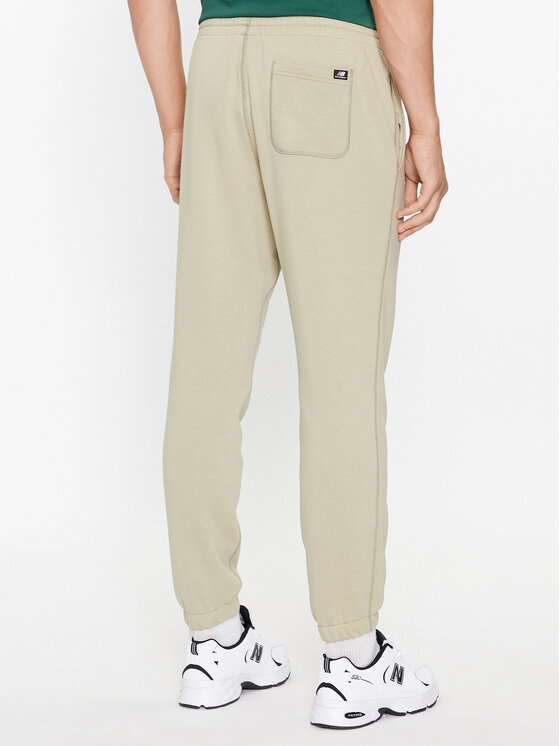 New Balance New Balance Spodnie dresowe NB Essentials Sweatpant MP33509 Zielony Regular Fit