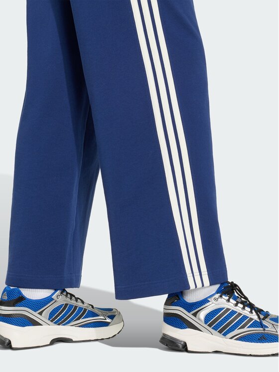 adidas adidas Spodnie materiałowe 164808 Niebieski Loose Fit