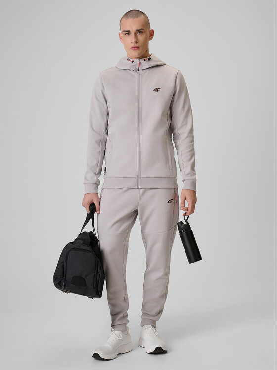 4F 4F Spodnie dresowe MONOCHROME MOVEMENT Szary jasny Regular Fit