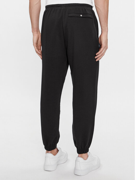 Puma Puma Donji dio trenerke Team 538261 Crna Relaxed Fit