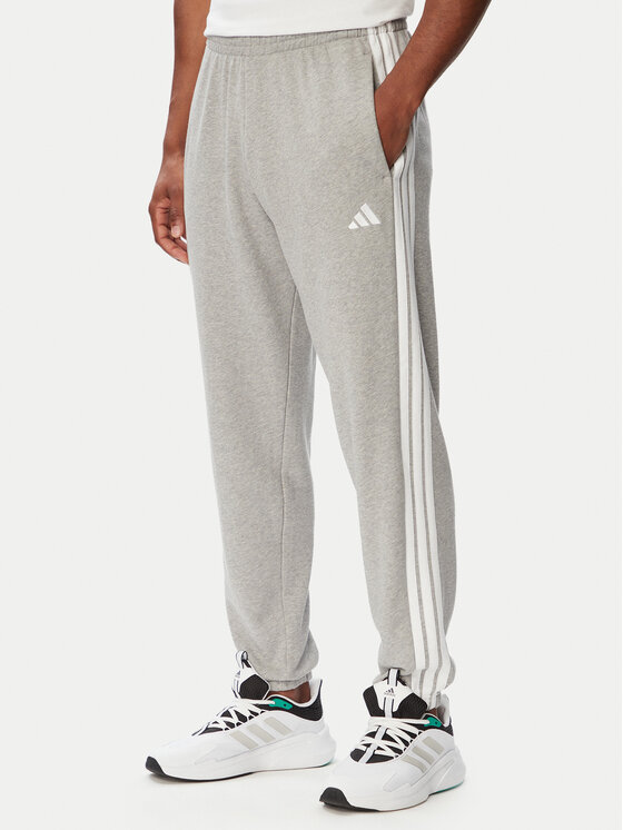 adidas Долнище анцуг Essentials 3-Stripes KY4195 Светлосив Regular Fit