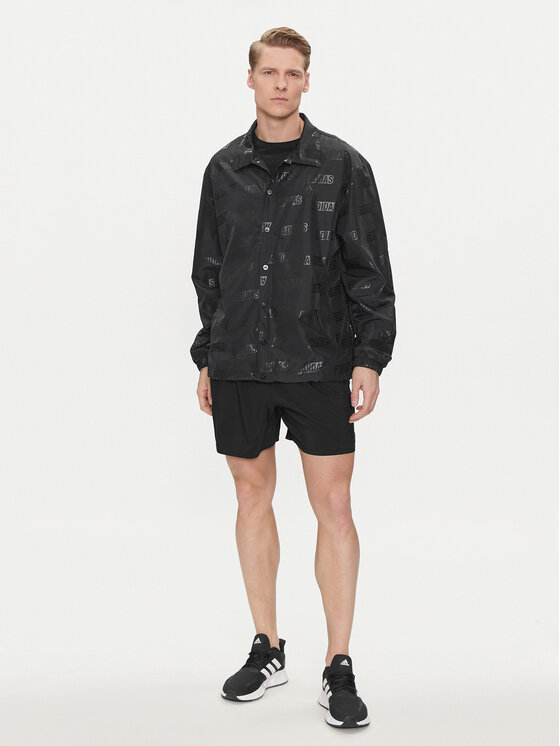 adidas adidas Демісезонна куртка Embossed Coaches IJ6434 Чорний Regular Fit