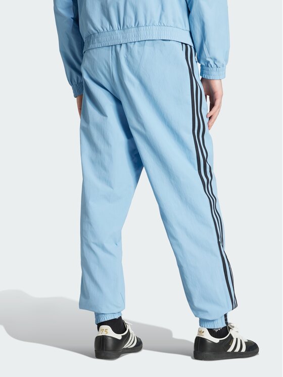adidas adidas Spodnie dresowe Adicolor Woven Firebird Błękitny Regular Fit