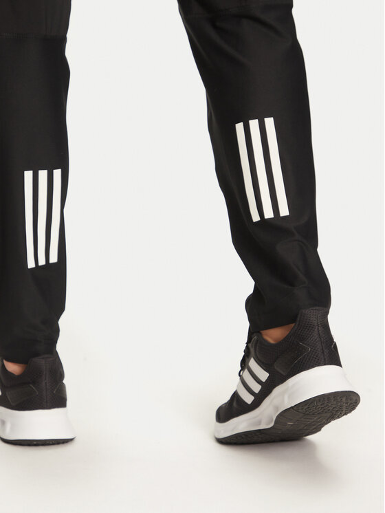 adidas adidas Donji dio trenerke Own The Run IK5024 Crna Regular Fit