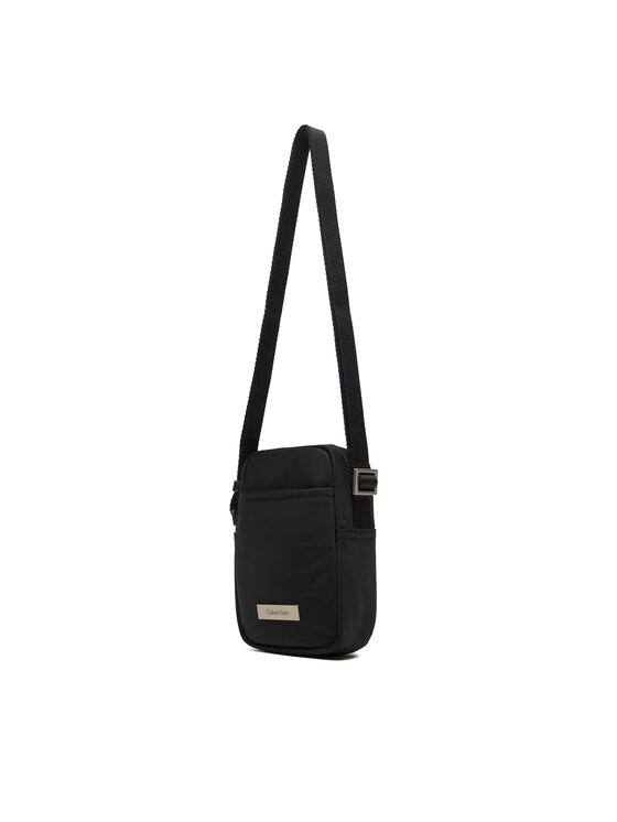 Calvin Klein Calvin Klein Saszetka Sleek Slim Reporter LV04D3233G Czarny