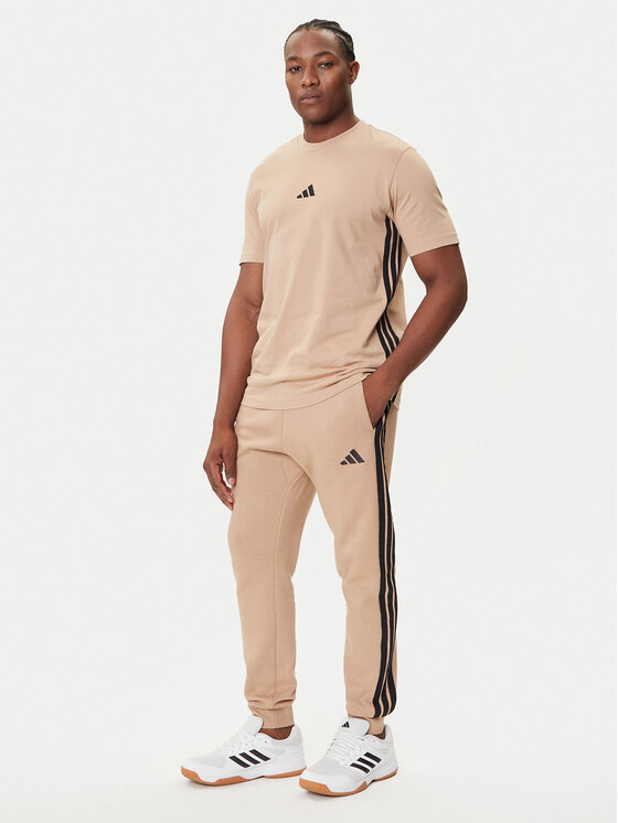 adidas adidas Teplákové nohavice Essentials 3-Stripes JX0712 Béžová Regular Fit