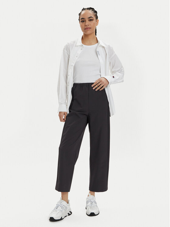 Champion Champion Pantaloni din material 117110 Gri Relaxed Fit
