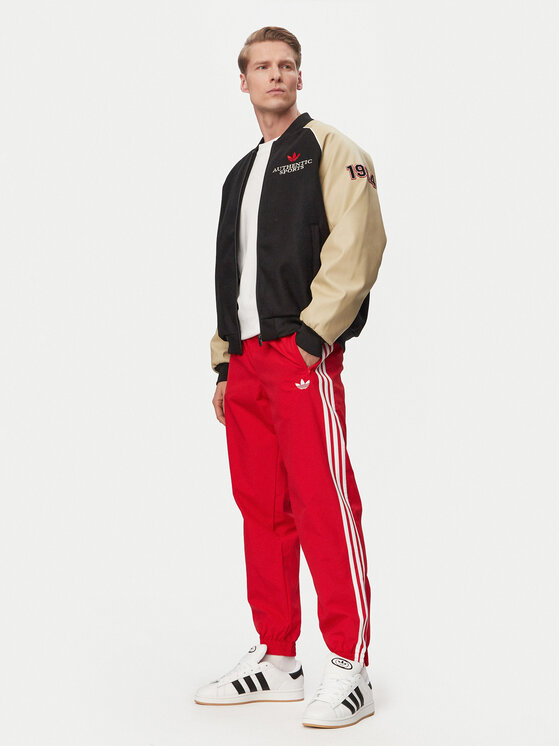adidas adidas Spodnie dresowe Firebird Woven KE1369 Czerwony Regular Fit
