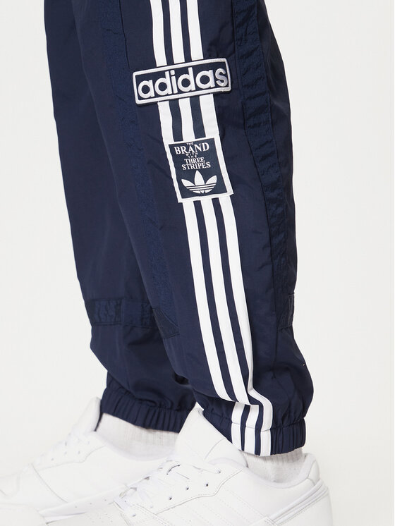 adidas adidas Spodnji del trenirke Adibreak JD4258 Mornarsko modra Loose Fit
