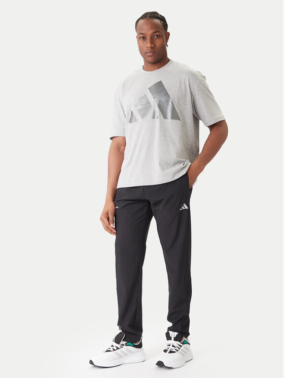 adidas adidas Pantaloni trening Training Essentials Holiday JM5441 Negru Regular Fit