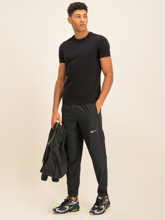 Nike Pantalon jogging Woven BV4840 Noir Regular Fit Modivo.fr