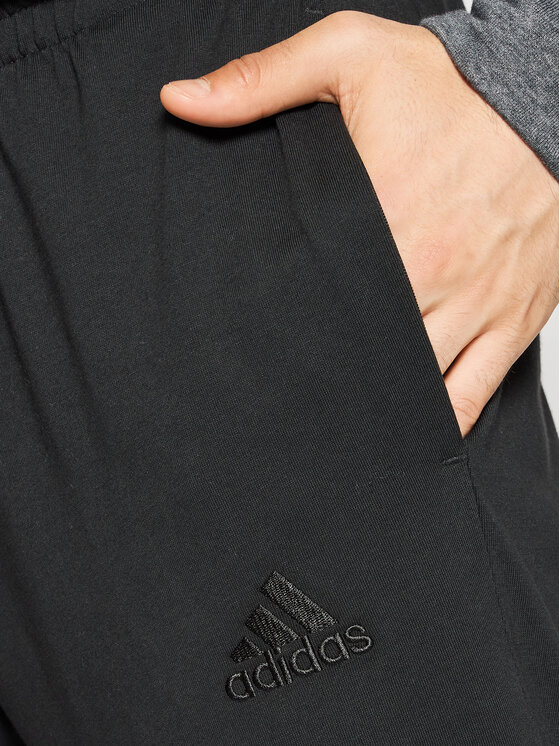 adidas Sportinės kelnės Essentials Single Jersey GK8827 Juoda Regular Fit •  Modivo.lt