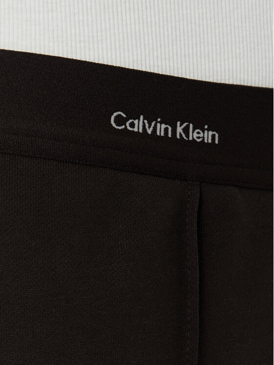 Calvin Klein Jeans Calvin Klein Jeans Spodnji del trenirke LV047G253G Temno rjava Relaxed Fit