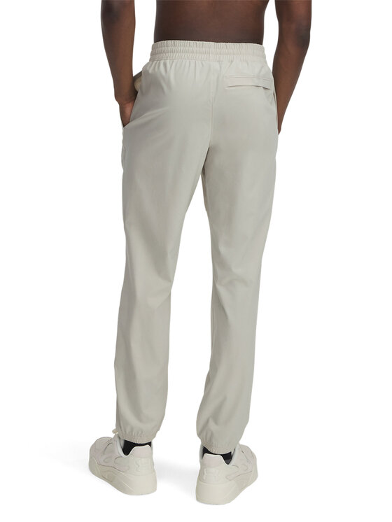 Under Armour Under Armour Spodnie dresowe 1386557 Beżowy Slim Fit