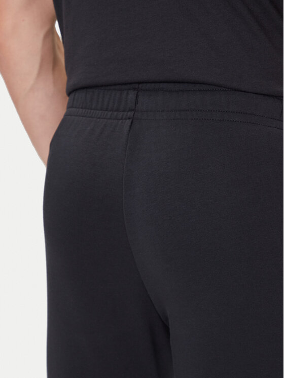 Under Armour Under Armour Spodnji del trenirke Ua Rival Terry Jogger 1380843-001 Črna Fitted Fit