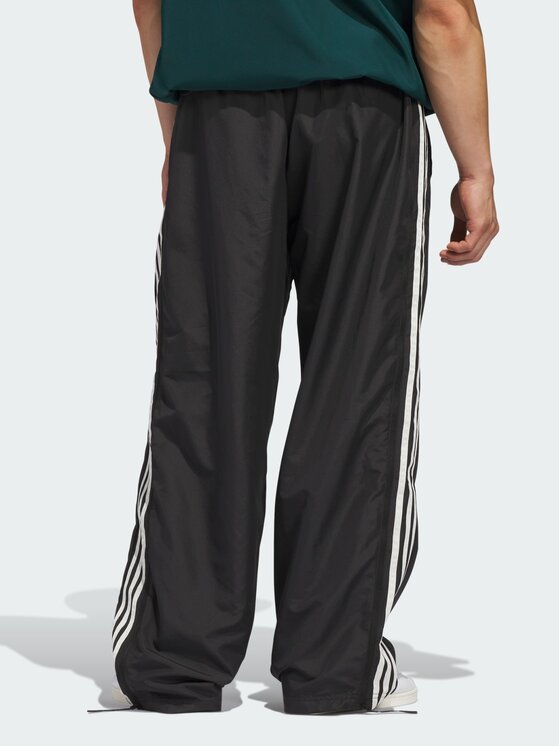 adidas adidas Spodnie materiałowe Basketball Windbreaker Czarny Loose Fit