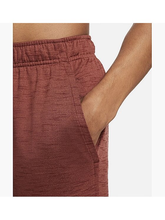 Nike Nike Spodnie dresowe YOGA DRI-FIT PANT Czerwony Regular Fit