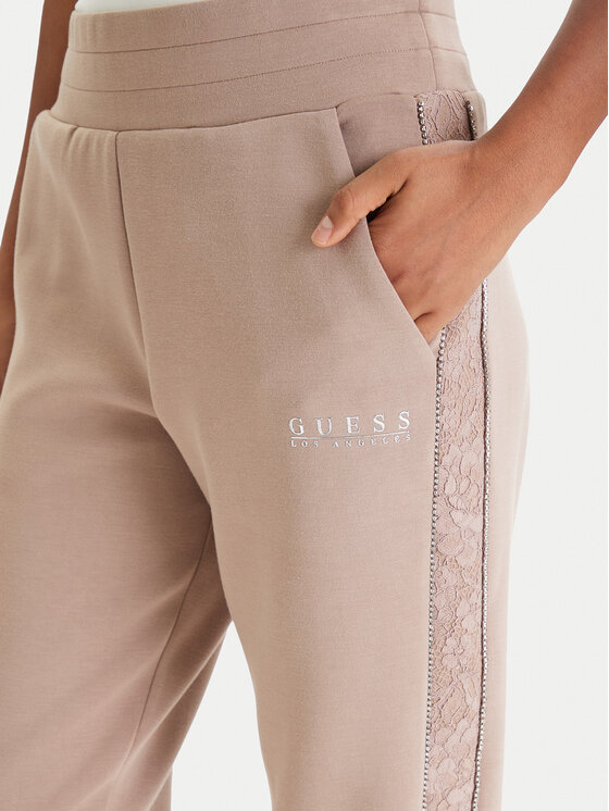 Guess Guess Spodnie dresowe W6RB45 KBYE2 Beżowy Regular Fit