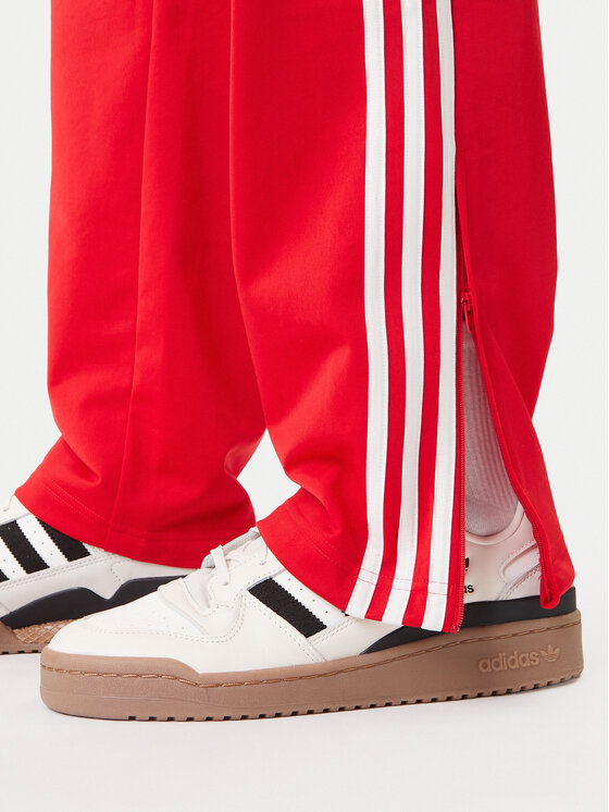 adidas adidas Teplákové nohavice Firebird KD8319 Červená Loose Fit