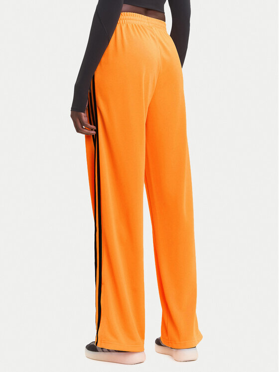 adidas adidas Долнище анцуг adicolor Classic Firebird JY2694 Жълт Loose Fit