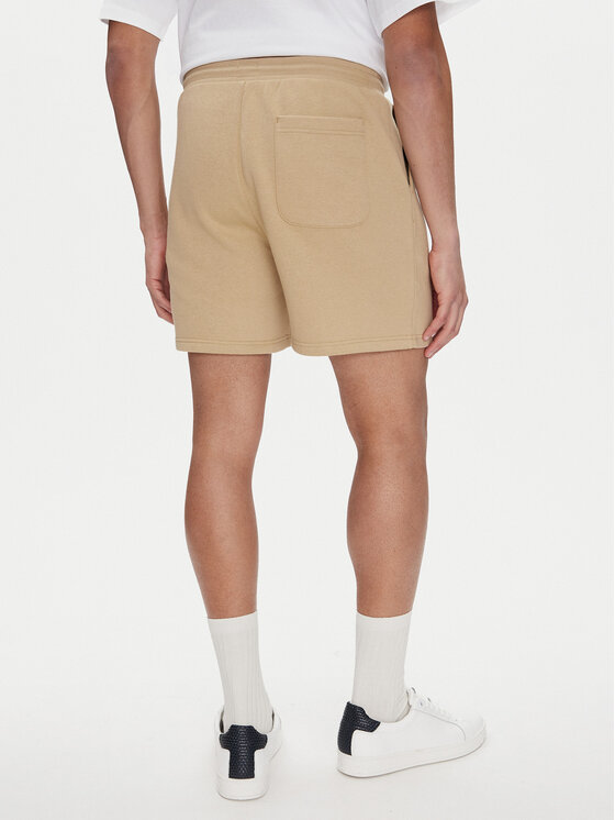 Tommy Jeans Tommy Jeans Sport rövidnadrág Flag Beach DM0DM21931 Bézs Regular Fit