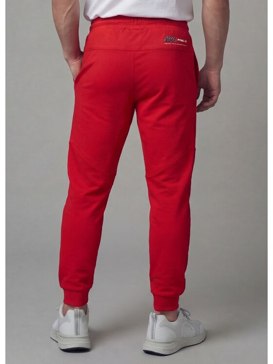PITBULL PITBULL Spodnie dresowe ADCC DOGWOOD POCKET Czerwony Regular Fit