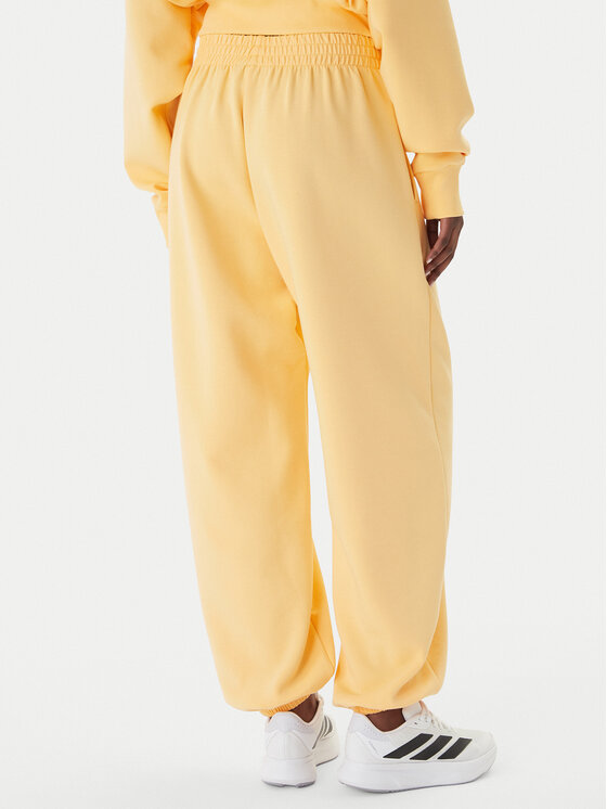 adidas adidas Sportinės kelnės Soft Lux KA7020 Oranžinė Loose Fit