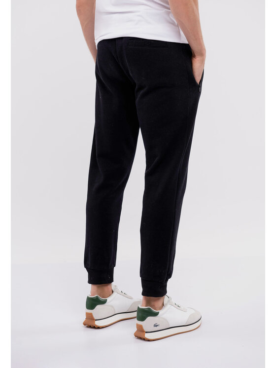 Volcano Volcano Spodnie dresowe N-NICER Czarny Regular Fit