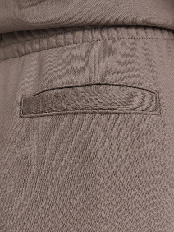 Calvin Klein Jeans Calvin Klein Jeans Spodnie dresowe Monogram LV047H220G Beżowy ciemny Regular Fit