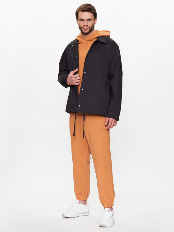 New Balance New Balance Μπουφάν μεταβατικό MJ23552 Μαύρο Relaxed Fit