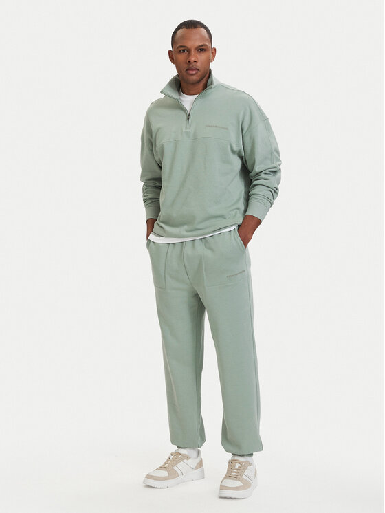 Tommy Hilfiger Tommy Hilfiger Spodnji del trenirke Essential UM0UM03911 Svetlo zelena Relaxed Fit