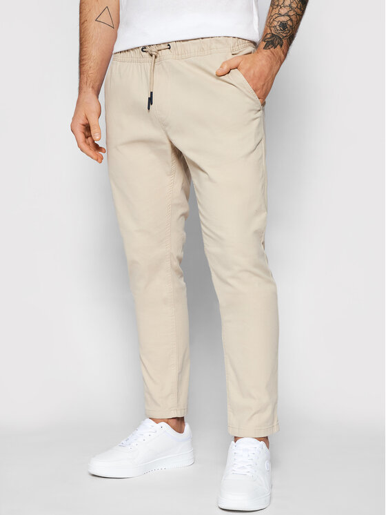 Tommy Jeans Spodnie materiałowe Scanton DM0DM10125 Beżowy Slim Fit •  Modivo.pl