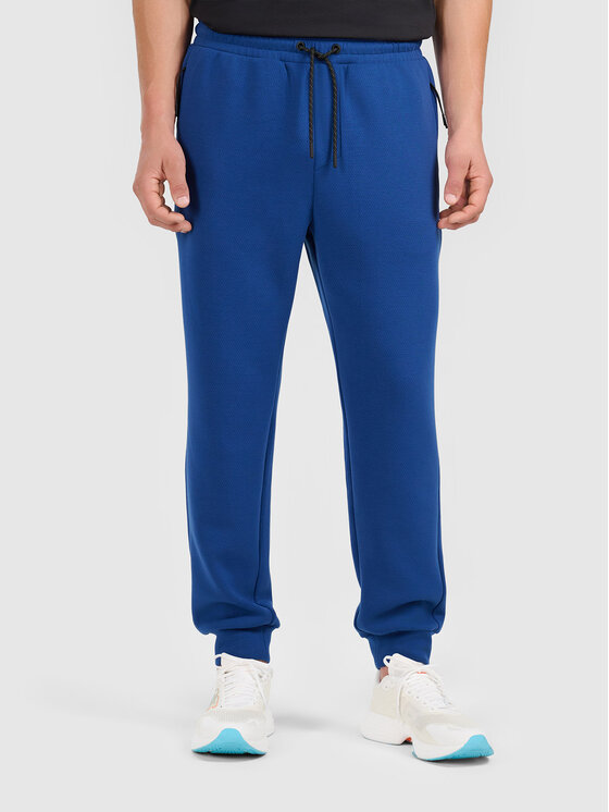 4F 4F Spodnie dresowe 4FWAW26TTROM1802-30S Granatowy Active Fit