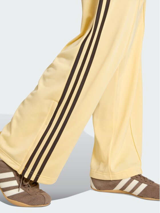 adidas adidas Spodnie dresowe FB TP LOOSE Pomarańczowy Loose Fit