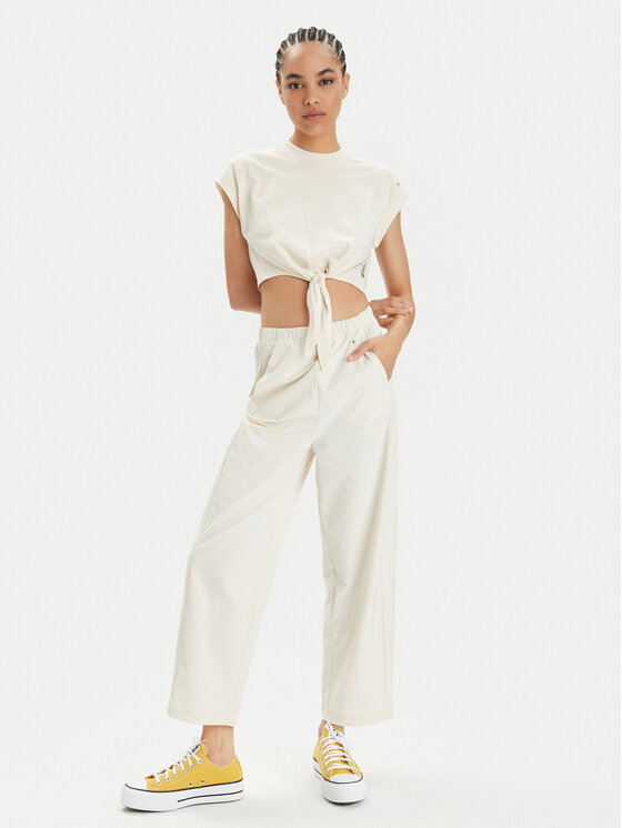Champion Champion Pantaloni di tessuto 117110 Beige Relaxed Fit