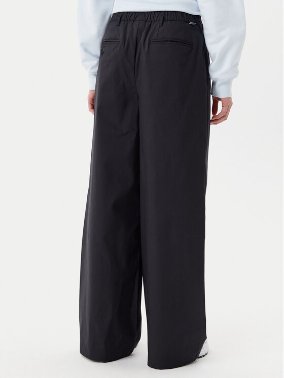 New Balance New Balance Stoffhose Boylston WP51538 Schwarz Relaxed Fit