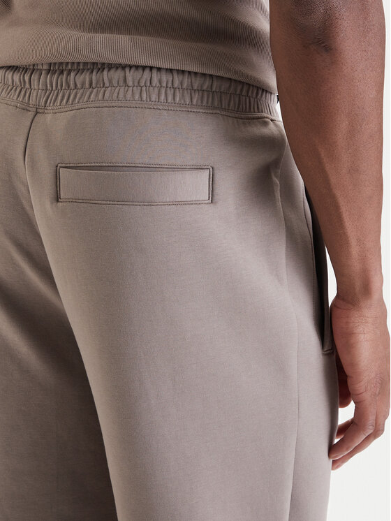 HUGO HUGO Долнище анцуг Dimacs 50533695 Бежов Relaxed Fit