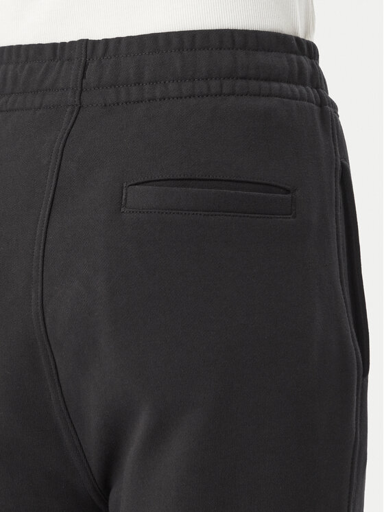 Calvin Klein Jeans Calvin Klein Jeans Spodnie dresowe Monogram LV047H220G Czarny Flare Fit