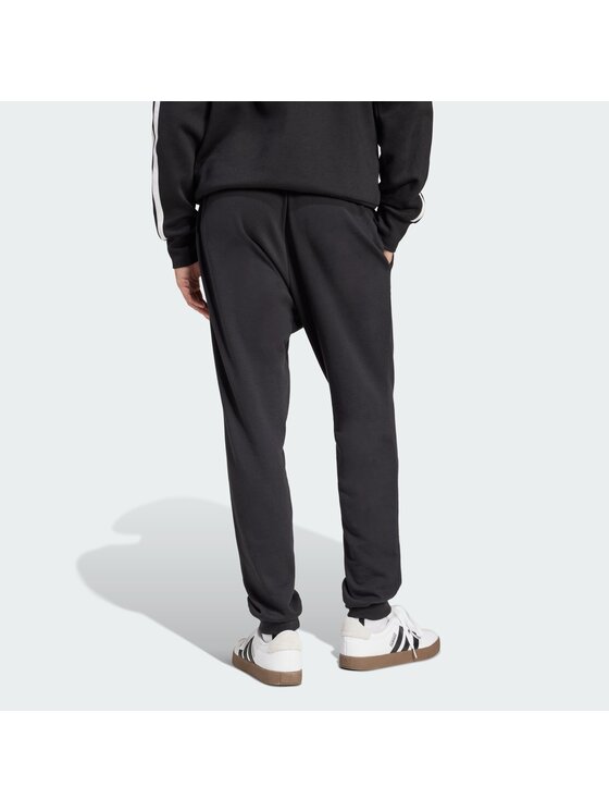 adidas adidas Спортивні штани Essentials Feel Cozy JE3854 Чорний Regular Fit
