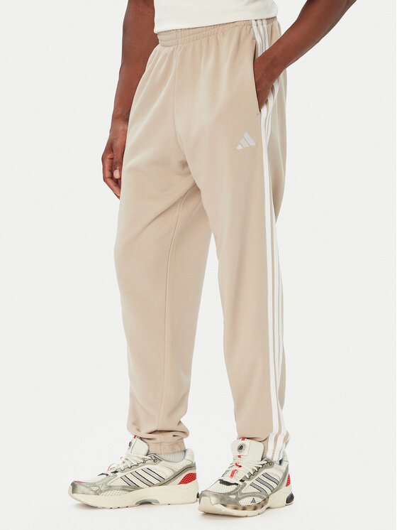adidas adidas Sportinės kelnės Essentials 3-Stripes French Terry Tapered Cuffed KY4196 Smėlio Regular Fit