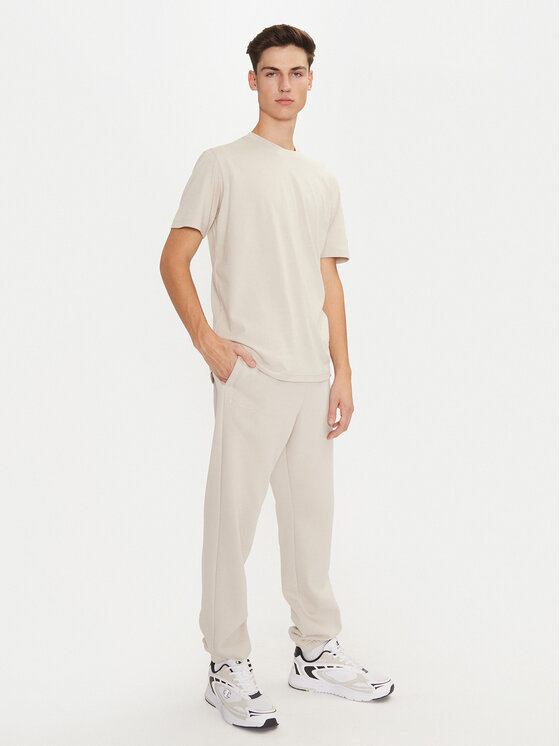 Champion Champion Donji dio trenerke 220424 Écru Regular Fit