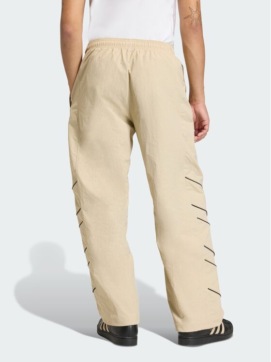 adidas adidas Spodnie dresowe Cutline Beżowy Loose Fit