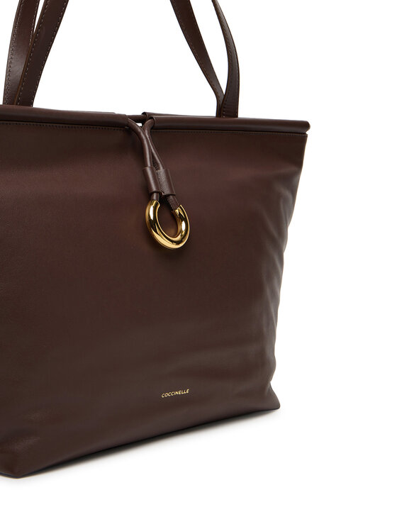 Torebka shopper widziana pod kątem z przodu, zbliżenie na górną część.