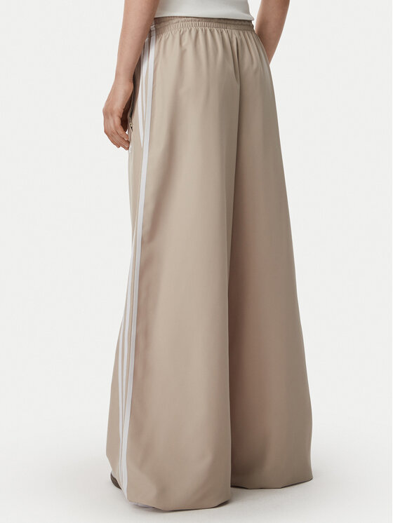 adidas adidas Pantaloni da tuta Firebrid Adilenium Track KT0019 Beige Relaxed Fit