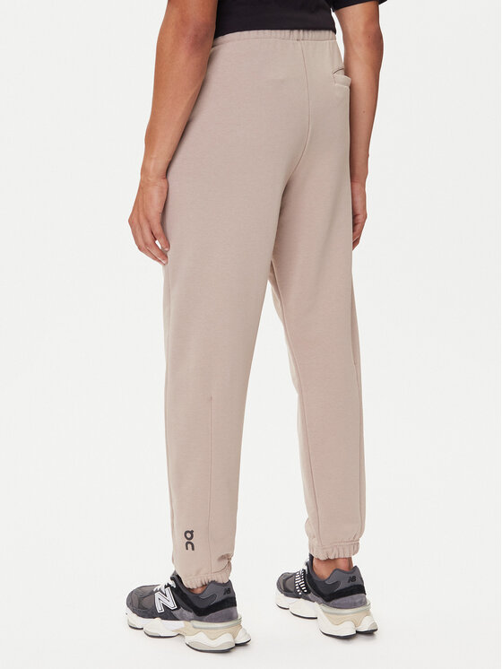 On On Donji dio trenerke Club Pants 1ME1004 Bež Relaxed Fit