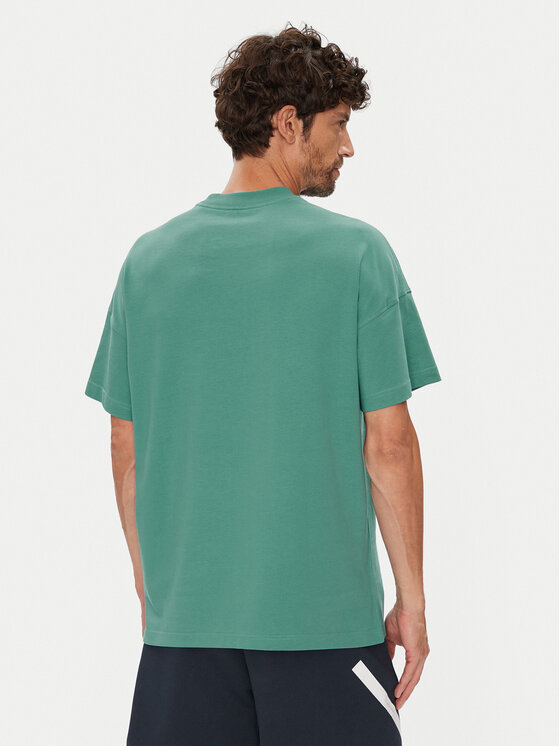 adidas adidas T-Shirt ALL SZN JX5085 Turkusowy Loose Fit